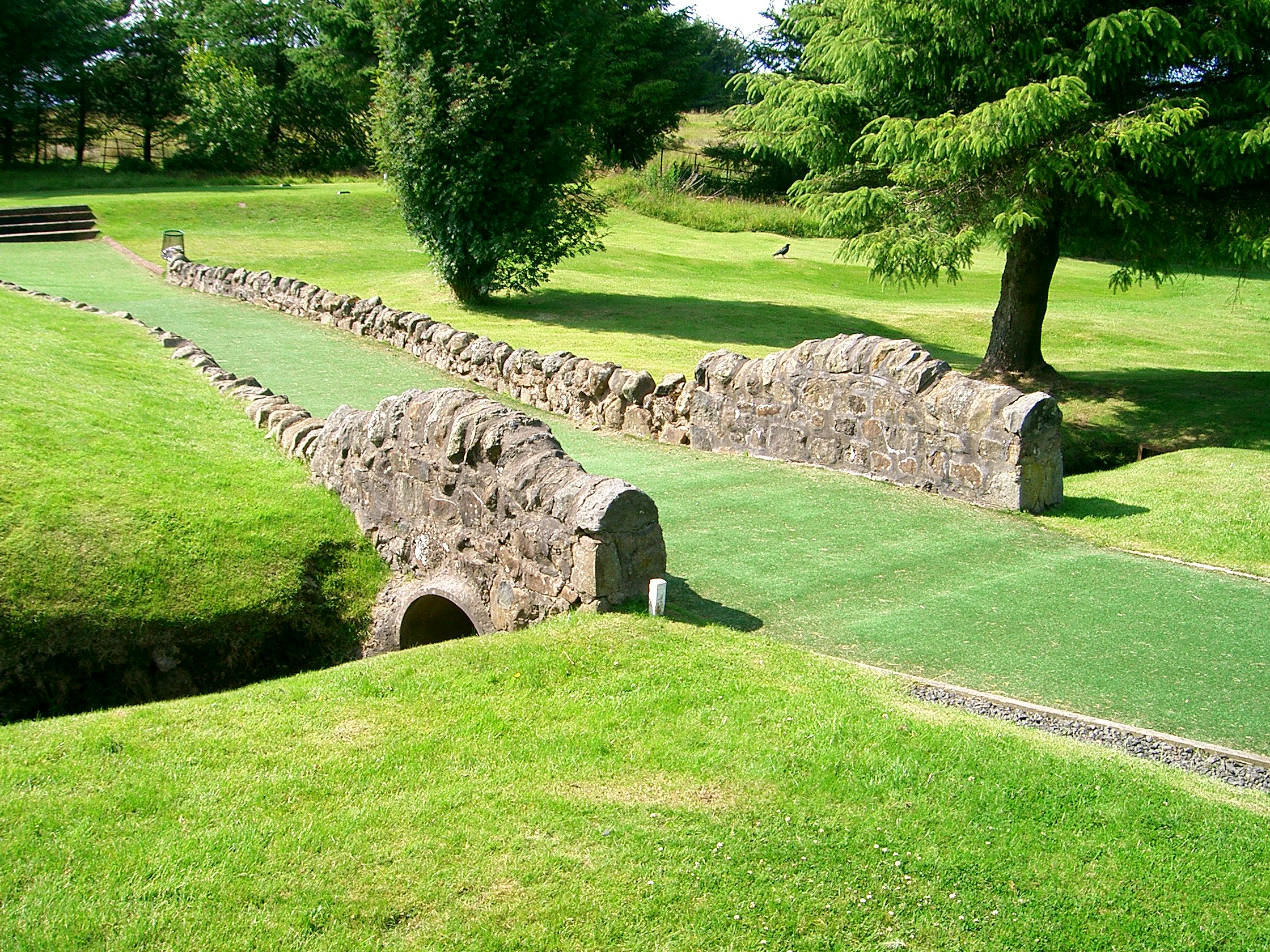 pathway across a small cobbled bridge